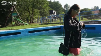 Waterpark Fun For Fully Clothed Brunette Babe Screencap 7 on sinx.preview.netperv.com