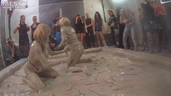 Messy Wrestling: Tattooed Beauty, Ripped Clothes & Lots Of Mud Covered Booby & Booty! Screencap 23 on sinx.preview.netperv.com