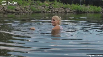 Seductive Blonde Smokes And Gets Drenched In Lake Screencap 33 on sinx.preview.netperv.com