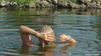 Seductive Blonde Smokes And Gets Drenched In Lake Screencap 43 on sinx.preview.netperv.com