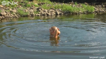 Seductive Blonde Smokes And Gets Drenched In Lake Screencap 53 on sinx.preview.netperv.com