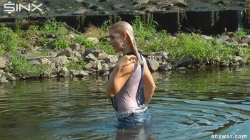 Seductive Blonde Smokes And Gets Drenched In Lake Screencap 54 on sinx.preview.netperv.com