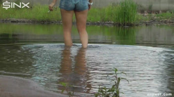 Seductive Blonde Smokes And Gets Drenched In Lake Screencap 6 on sinx.preview.netperv.com
