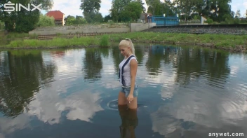 Seductive Blonde Smokes And Gets Drenched In Lake Screencap 9 on sinx.preview.netperv.com