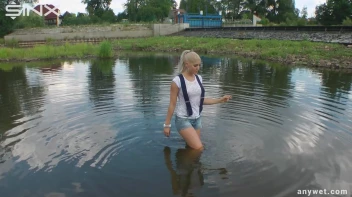 Seductive Blonde Smokes And Gets Drenched In Lake Screencap 12 on sinx.preview.netperv.com