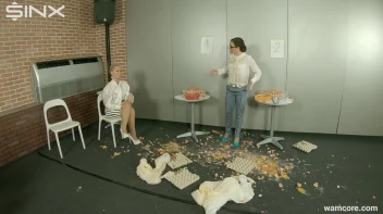 Playful businesswomen cover each other in raw egg Screencap 1 on sinx.preview.netperv.com