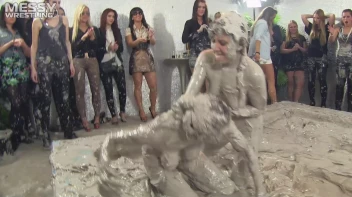 Muddy Wrestling: Satin, Skirts, and Audience Mud Blasted To The Max!  Everyone Gets A Taste! Screencap 95 on sinx.preview.netperv.com