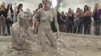 Muddy Wrestling: Satin, Skirts, and Audience Mud Blasted To The Max!  Everyone Gets A Taste! Screencap 96 on sinx.preview.netperv.com