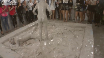 Muddy Wrestling: Satin, Skirts, and Audience Mud Blasted To The Max!  Everyone Gets A Taste! Screencap 108 on sinx.preview.netperv.com