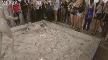 Muddy Wrestling: Satin, Skirts, and Audience Mud Blasted To The Max!  Everyone Gets A Taste! Screencap 110 on sinx.preview.netperv.com