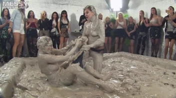 Muddy Wrestling: Satin, Skirts, and Audience Mud Blasted To The Max!  Everyone Gets A Taste! Screencap 47 on sinx.preview.netperv.com