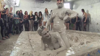 Muddy Wrestling: Satin, Skirts, and Audience Mud Blasted To The Max!  Everyone Gets A Taste! Screencap 69 on sinx.preview.netperv.com