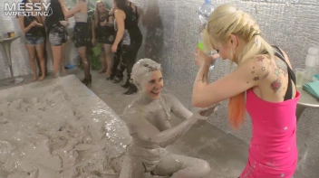 Muddy Wrestling: Satin, Skirts, and Audience Mud Blasted To The Max!  Everyone Gets A Taste! Screencap 77 on sinx.preview.netperv.com