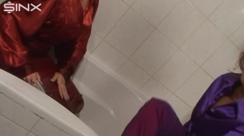 Slippery Clothed Bathtub Fun For Lesbians Screencap 19 on sinx.preview.netperv.com