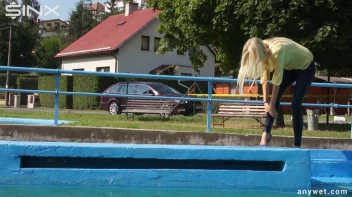 Sexy Blonde Swims And Splashes In Outdoor Pool Screencap 15 on sinx.preview.netperv.com