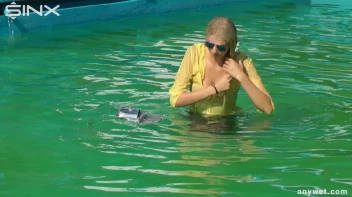 Sexy Blonde Swims And Splashes In Outdoor Pool Screencap 26 on sinx.preview.netperv.com