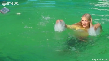 Sexy Blonde Swims And Splashes In Outdoor Pool Screencap 40 on sinx.preview.netperv.com