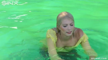 Sexy Blonde Swims And Splashes In Outdoor Pool Screencap 42 on sinx.preview.netperv.com