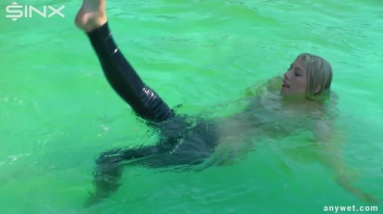 Sexy Blonde Swims And Splashes In Outdoor Pool Screencap 51 on sinx.preview.netperv.com