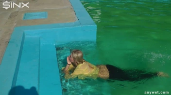 Sexy Blonde Swims And Splashes In Outdoor Pool Screencap 61 on sinx.preview.netperv.com
