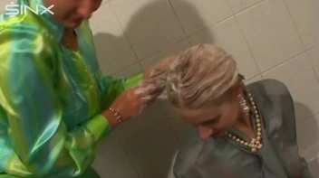 Fully Dressed Ladies Wash Their Hair Together Screencap 12 on sinx.preview.netperv.com