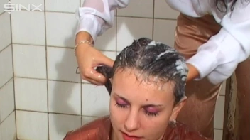 Raven Haired Babes Lather Up Their Hair Screencap 14 on sinx.preview.netperv.com