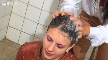 Raven Haired Babes Lather Up Their Hair Screencap 12 on sinx.preview.netperv.com