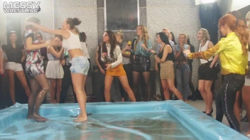 Messy Wrestling: Oiled Up Babes Go Tit For Tat In The Pit! Screencap 11 on sinx.preview.netperv.com