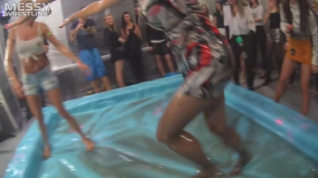 Messy Wrestling: Oiled Up Babes Go Tit For Tat In The Pit! Screencap 16 on sinx.preview.netperv.com