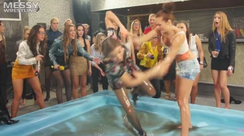 Messy Wrestling: Oiled Up Babes Go Tit For Tat In The Pit! Screencap 33 on sinx.preview.netperv.com