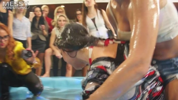 Messy Wrestling: Oiled Up Babes Go Tit For Tat In The Pit! Screencap 55 on sinx.preview.netperv.com