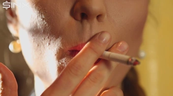 Beautiful Brunette Smiles While Enjoying A Cigarette Screencap 15 on sinx.preview.netperv.com