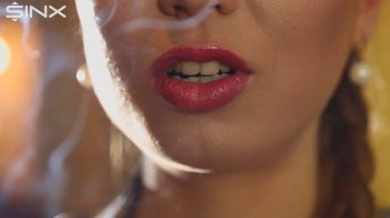 Beautiful Brunette Smiles While Enjoying A Cigarette Screencap 4 on sinx.preview.netperv.com