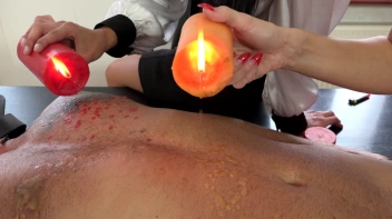 Two Sexy Dommes Torture Dude With Wax Screencap 19 on sinx.preview.netperv.com