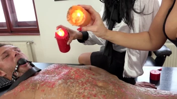 Two Sexy Dommes Torture Dude With Wax Screencap 39 on sinx.preview.netperv.com