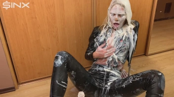 Messy Blonde In Leather Drenches Herself In Cream Screencap 48 on sinx.preview.netperv.com