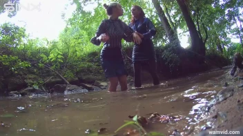 Clothed Babes Get Drenched And Catfight In Stream Screencap 56 on sinx.preview.netperv.com