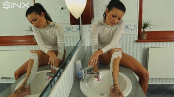 Stunning European Shaves Her Legs In The Sink Screencap 15 on sinx.preview.netperv.com