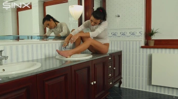 Stunning European Shaves Her Legs In The Sink Screencap 25 on sinx.preview.netperv.com