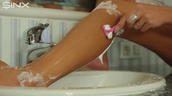 Stunning European Shaves Her Legs In The Sink Screencap 35 on sinx.preview.netperv.com